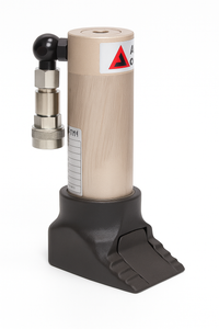 Mechanical device with cylindrical beige component and black base on a white background