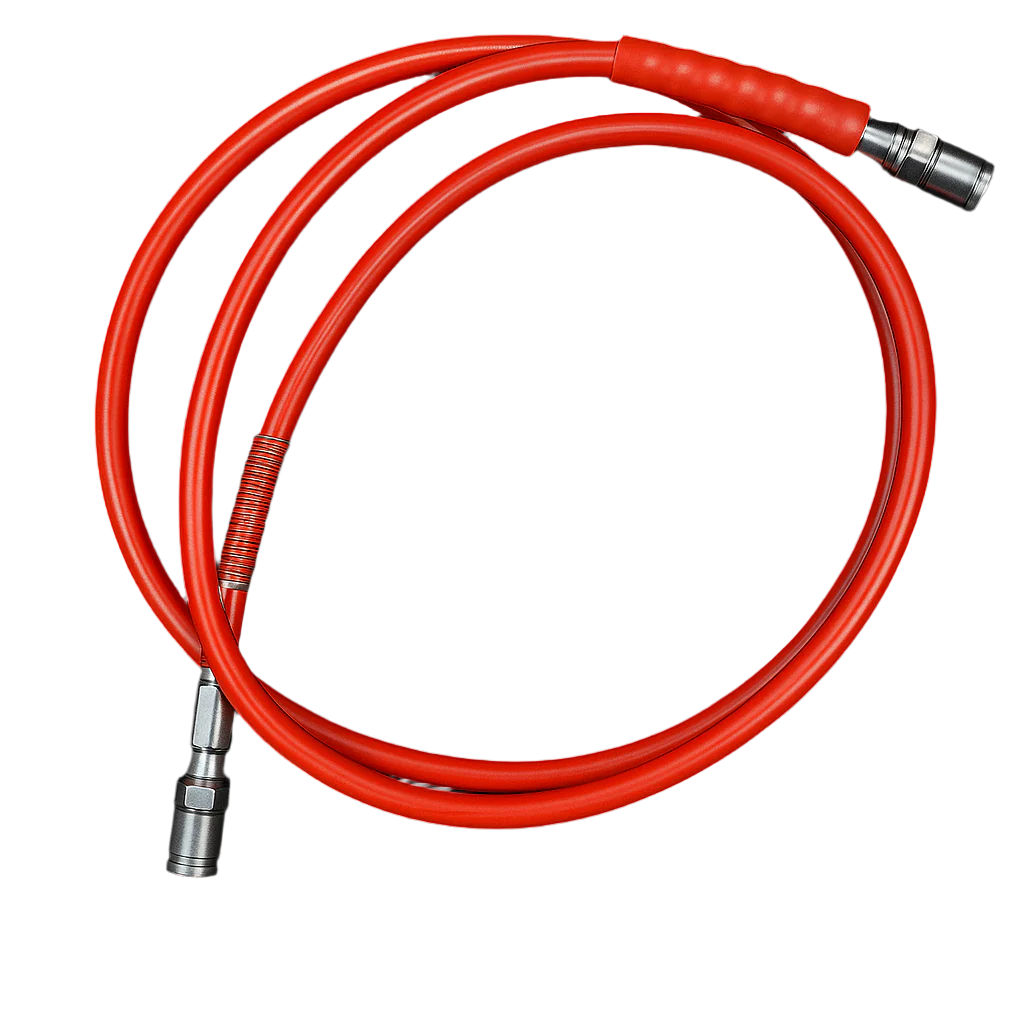 Coiled red hose with metal connectors on a white background